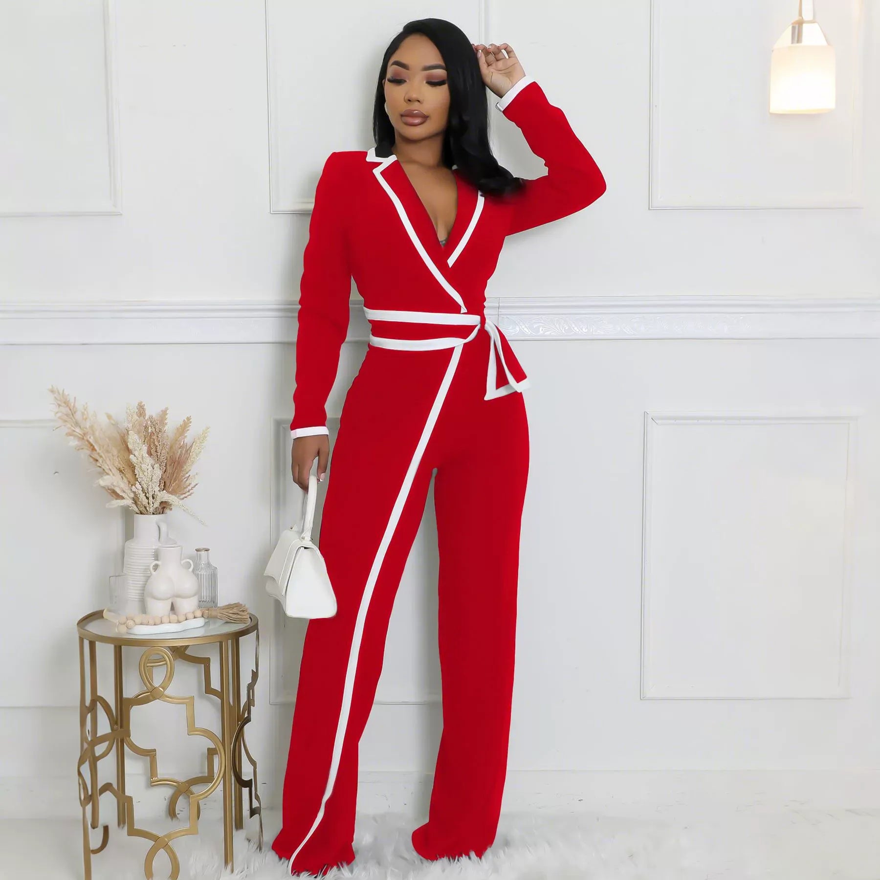 Belted long-sleeved jumpsuit