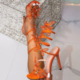Serpentine Crystal Bow Sandals