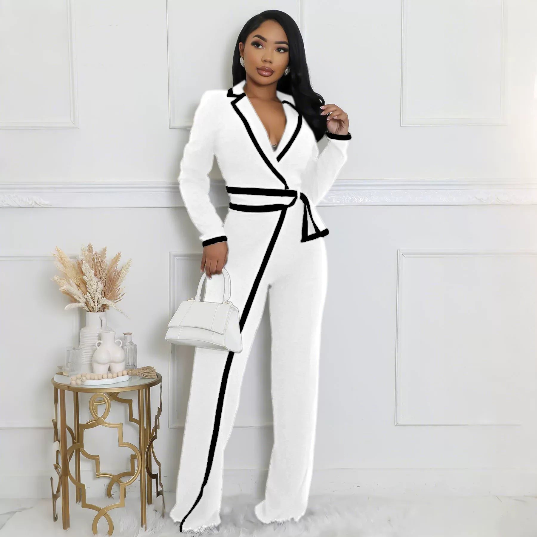 Belted long-sleeved jumpsuit