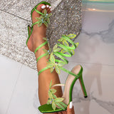 Serpentine Crystal Bow Sandals